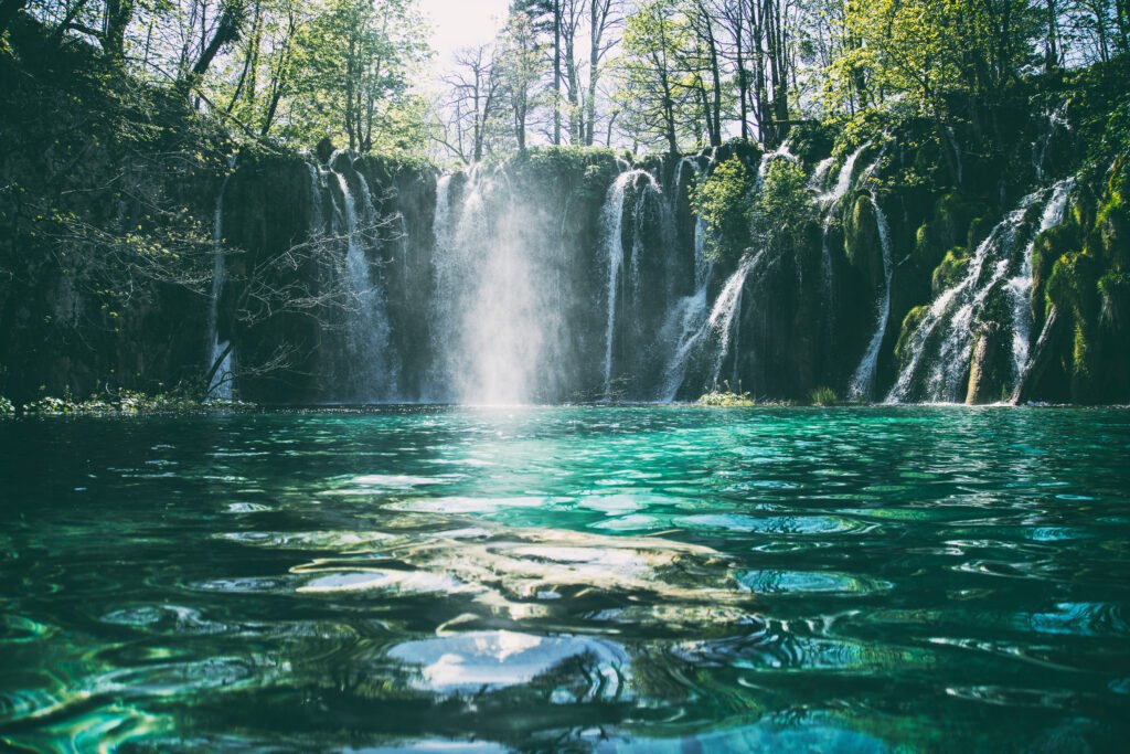 time-lapse photography of flowing multi-tier waterfall and time-lapse photography of flowing multi-tier waterfall and Spring Water 