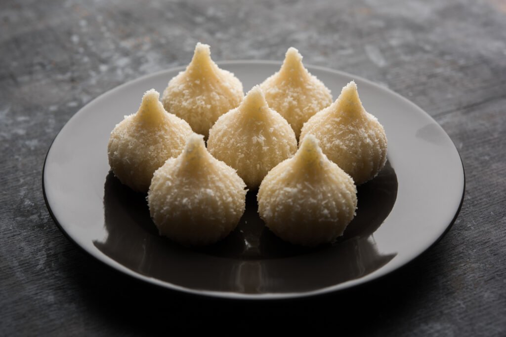 coconut modak, coconut modak recipe, coconut modak online, fresh coconut modak, modak with coconut filling, dry coconut modak recipe, modak dry coconut, dry coconut modak, coconut filling modak