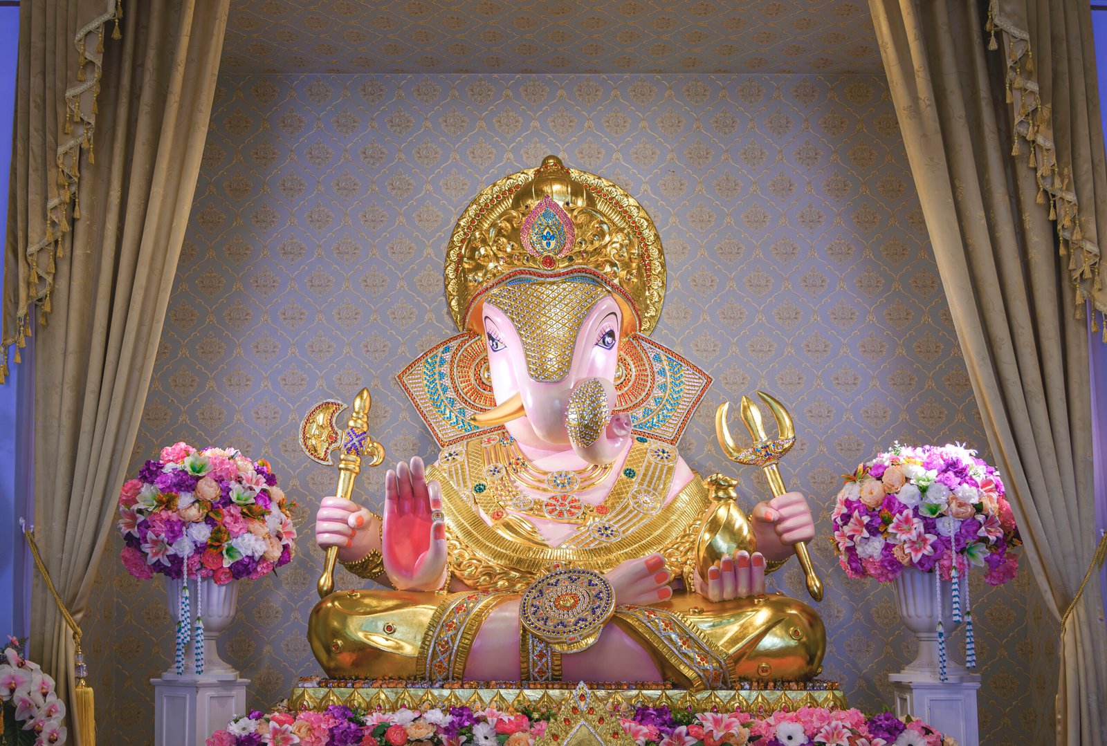 Beautiful Lord Ganesha Dagadusheth statue enshrined in a Hindu temple, Happy Ganesh Chaturthi