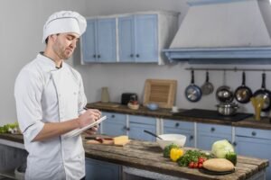 chef kitchen taking notes