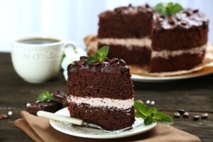 delicious chocolate cake table light background scaled