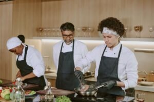 Indian chef controlling his subordinates