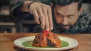 Close-up of man having food