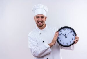 Professional male chef cook in white uniform