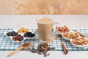 Various nuts with aroma cup of coffee