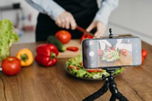Female food blogger streaming at home
