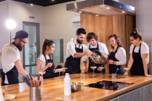 chef teaching trainees how make ice cream cooking